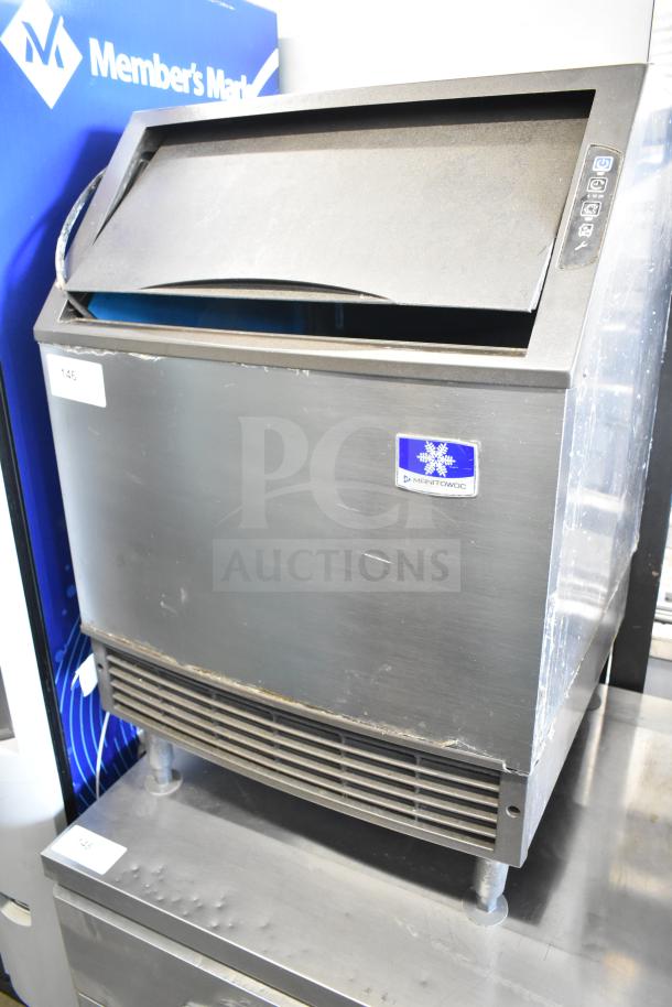 Manitowoc UYF0140A-161B commercial ice machine, stainless steel, 115 volts, front control panel, minor exterior wear.