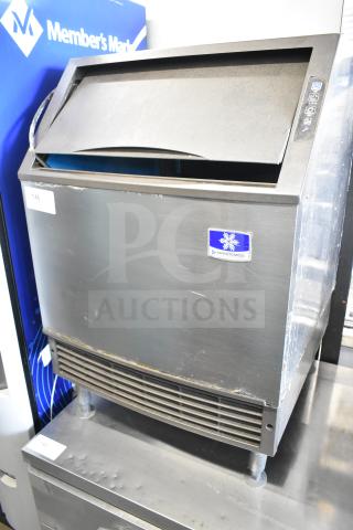 Manitowoc UYF0140A-161B commercial ice machine, stainless steel, 115 volts, front control panel, minor exterior wear.