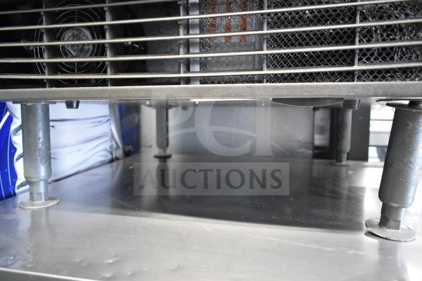 Manitowoc UYF0140A-161B ice machine, metal grill and legs visible, 115V, 1 phase, commercial use, clean condition.