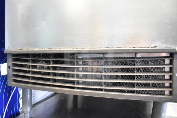 Manitowoc UYF0140A-161B ice machine, 115V, 1 phase, shows front grill and wear, commercial-grade condition.