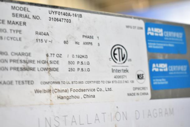 Manitowoc UYF0140A-161B commercial ice machine label, shows model, 115V power, ETL, NSF certifications, and manufacturer details.