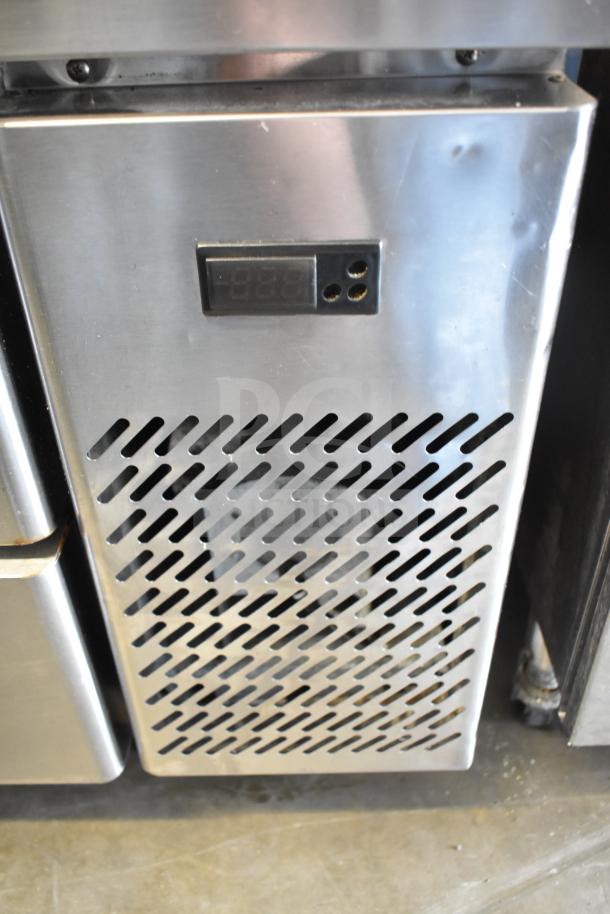 Commercial 4 drawer chef base with vented stainless steel front, digital display, on commercial casters. 115V, 1 Phase.