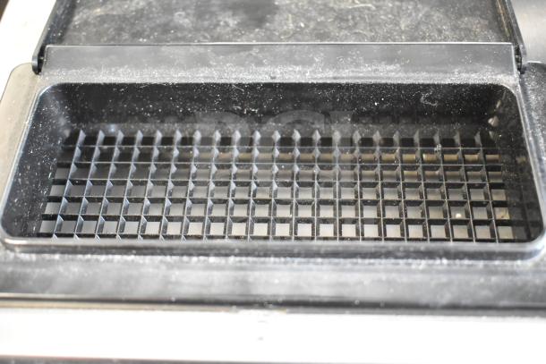 2024 Bunn CWTF15 commercial coffee machine's top view showing grid surface, in good condition, ideal for high-volume use.