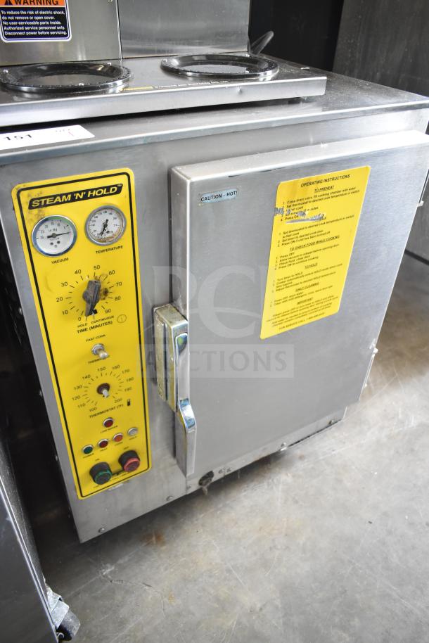 Commercial electric steam 'n' hold cabinet, single compartment, 208/240V, stainless steel, operational gauges and instructions visible.