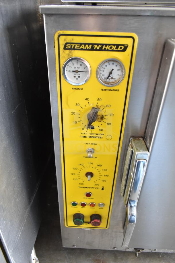 Commercial Electric Steam 'N' Hold Cabinet, single compartment, 208/240V, temperature and vacuum gauges, good condition.