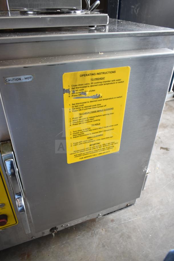 Commercial electric steam-and-hold cabinet, single compartment, 208/240 volts, stainless steel, with operating instructions label.