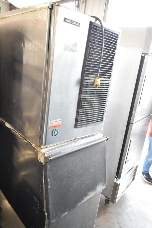 Hoshizaki KM-515MAJ ice head on bin, 115V, 1-phase. Visible wear, intact brand and certification labels, key features for commercial use.