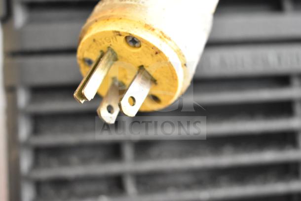 Hoshizaki KM-515MAJ commercial ice head, 115 volts, 1 phase, close-up of plug, details industrial design.