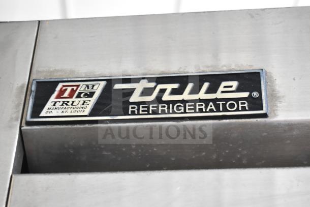 True T-23-2 Commercial Cooler, stainless steel, visible True logo. Designed for 115 volts, 1 phase.