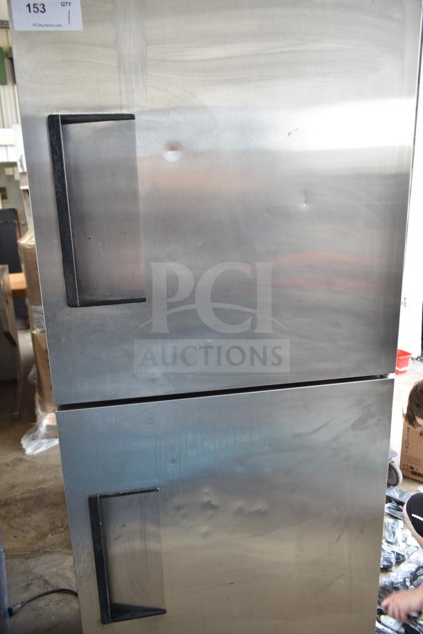 True T-23-2 commercial reach-in cooler, two half-size doors, on casters, 115V, 1 Phase, visible dents, stainless steel.