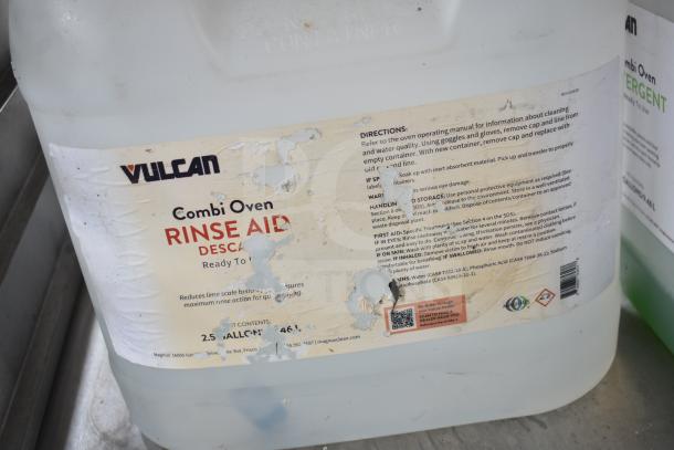 2022 Vulcan V1PJ102G-81 commercial gas combi oven with pan rack, full-size, new, model shown with accompanying rinse aid container.