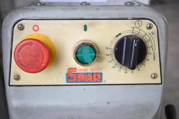 Spar 30HI-J commercial dough mixer control panel with red stop button, green start button, and speed dial; logo visible.