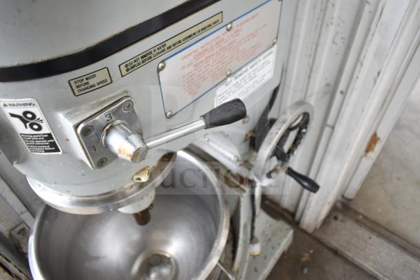 Spar 30HI-J commercial dough mixer with 30-quart bowl, 220 volts, 1 phase. Visible control lever, usage instructions.