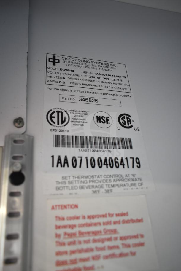 QBD DC26HB Commercial Reach In Cooler label, showing model, voltage, and safety certifications.