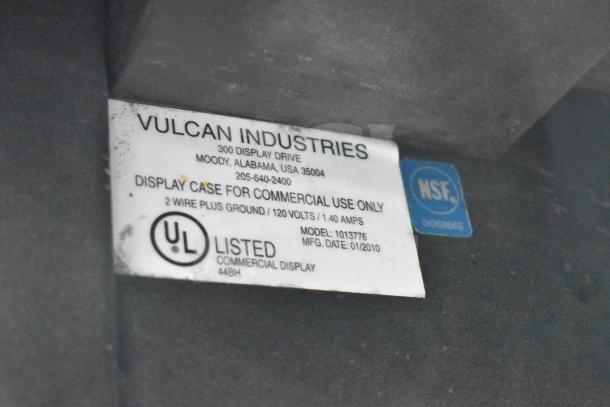 Vulcan 1013776 Commercial Pastry Merchandiser with casters, UL listed, 120V, model label indicates use for commercial purposes.