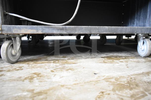 Vulcan 1013776 pastry bakery bagel merchandiser on commercial casters. Rugged metal frame. Good condition.