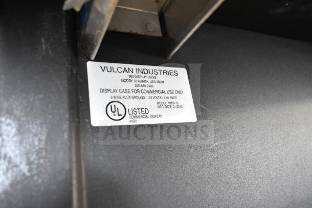 Vulcan 1013776 commercial pastry bagel merchandiser, UL listed, on casters. Label shows model, voltage, and mfg. date.
