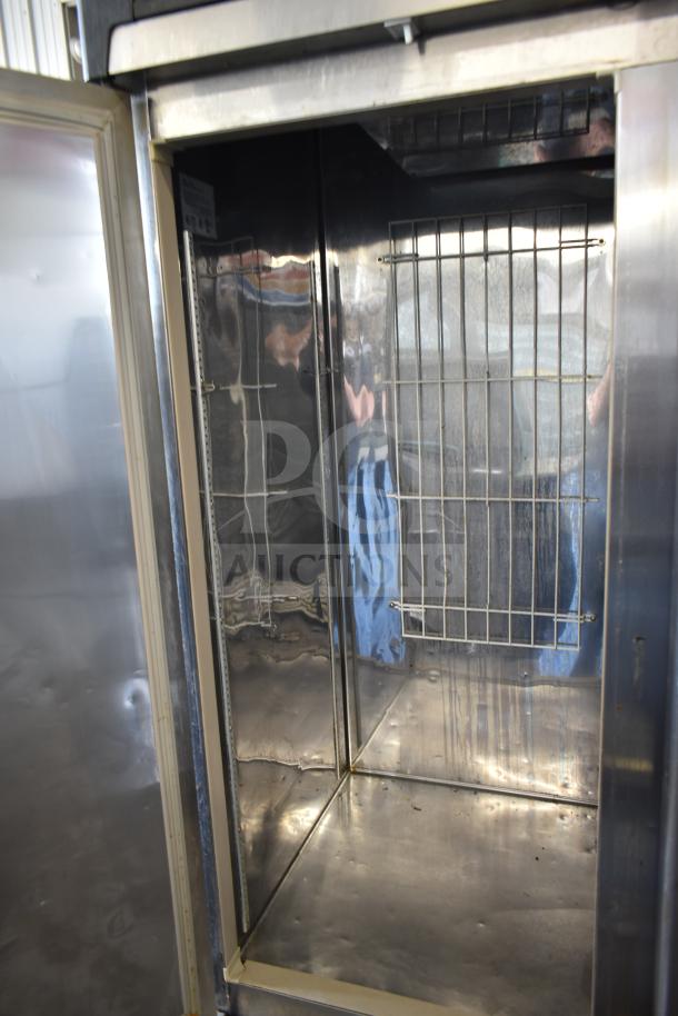 Master Bilt R49-S two-door reach-in cooler on casters, stainless steel interior, visible shelving, 115V, 1 phase.