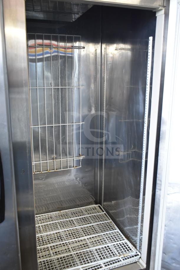 Master Bilt R49-S 2 Door Reach-In Cooler, stainless steel interior, on commercial casters, 115V, 1 Phase. 