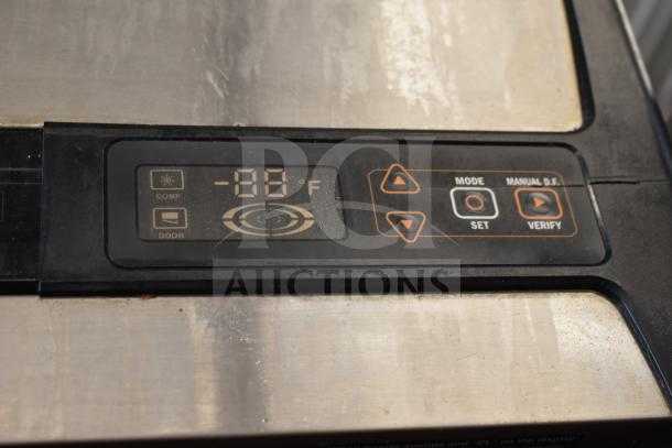 Control panel of Master Bilt R49-S commercial cooler, showing temperature and mode settings. In used condition.
