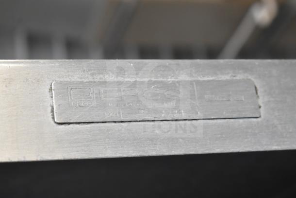 Lockwood commercial heated holding pan rack with metal tag showing EPCO, Model E, No. 7223, on durable casters.