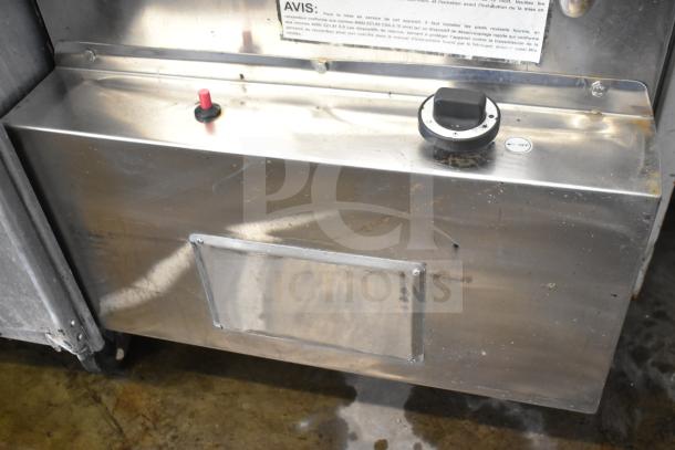 Puri Commercial Tandoori Clay Oven with control panel and commercial casters. Stainless steel finish, control knob, and on/off switch visible.