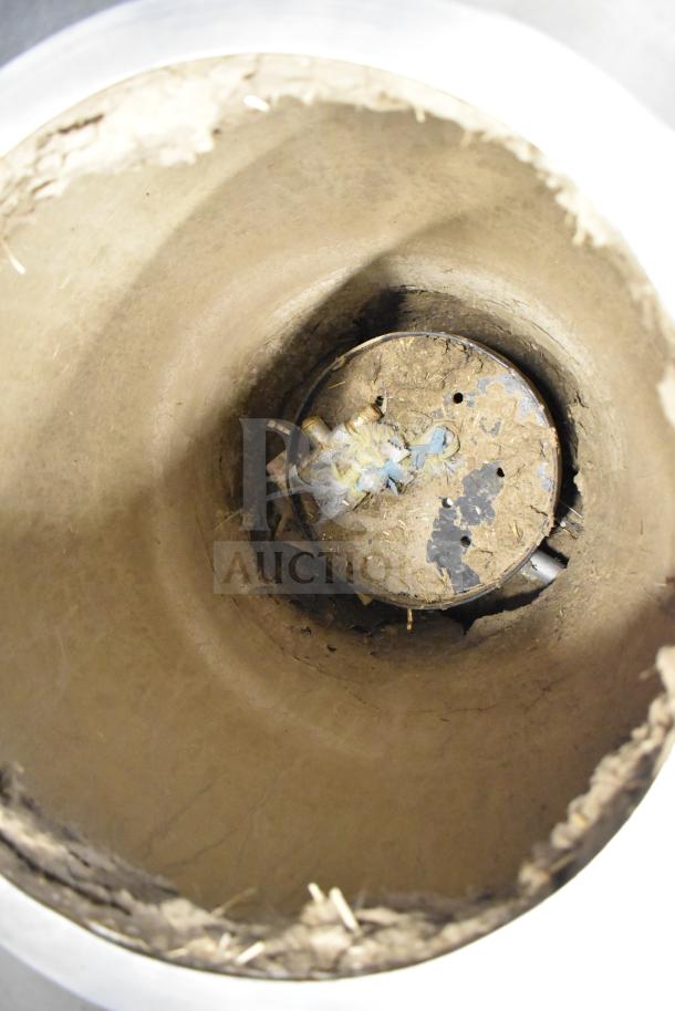 Puri Commercial Tandoori Clay Oven interior view, shows condition and clay texture. Includes commercial casters for mobility.