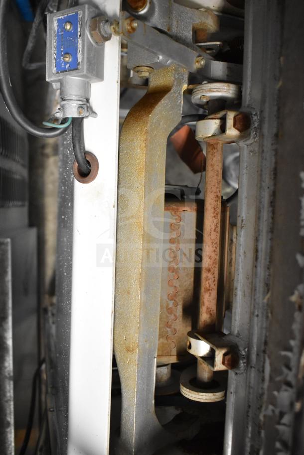 Oliver 777 Commercial Bread Loaf Slicer, floor style, 115 volts, 1 phase, visible wear, key components detailed.