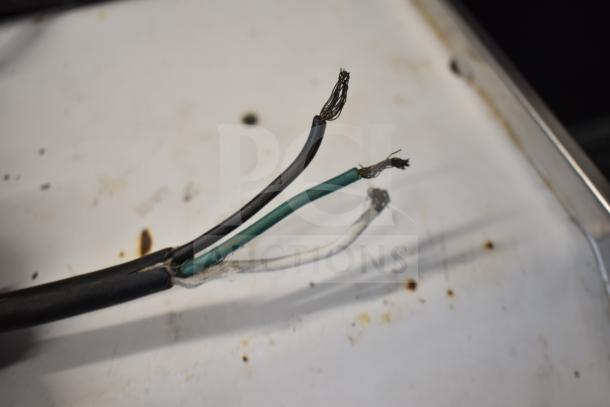 Oliver 777 Commercial Floor Bread Slicer showing exposed wires, indicating repair or maintenance needed. 115 Volts, 1 Phase.