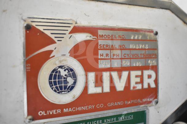 Oliver 777 Commercial Bread Slicer, 115V, 1 Phase, Model 777, Serial No. 103743, good condition, metal label visible.