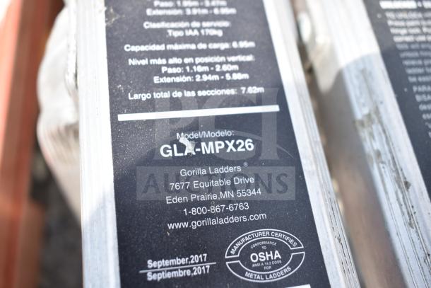 Close-up of a Gorilla GLA-MPX26 ladder label showing model info, manufacturer details, and OSHA certification.
