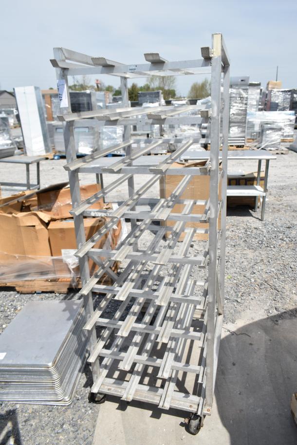 Commercial #10 can rack on metal frame with multiple shelves, mounted on commercial casters for mobility.