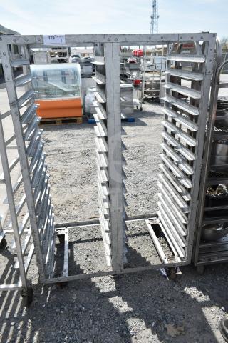 Commercial double pan transport rack with metal frame, multiple slots, and commercial casters, suitable for kitchens.