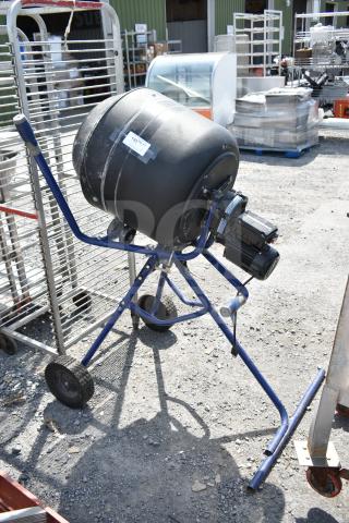 Kobalt 0241568 Concrete Mixer, black drum, blue frame, electric motor, slight wear, visible $799.97 price tag.