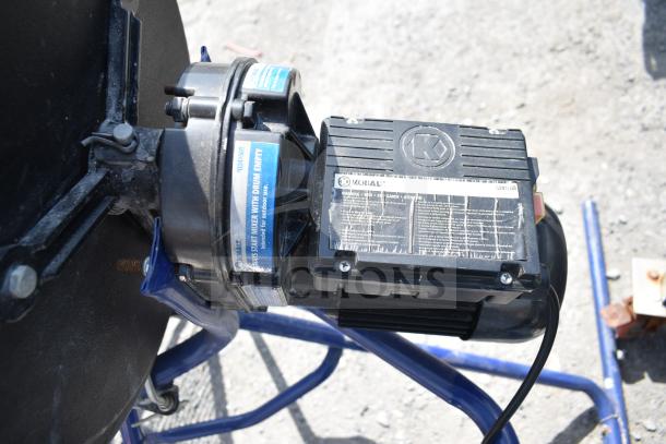 Kobalt 0241568 Concrete Mixer, close-up of motor and label, showing model number and usage instructions.