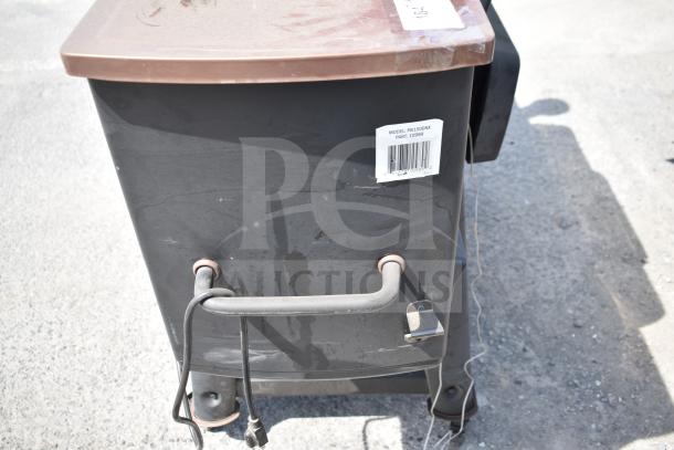 Pit Boss PB1500NX Savannah Pellet Grill with commercial casters; visible model label, exterior shows light wear.