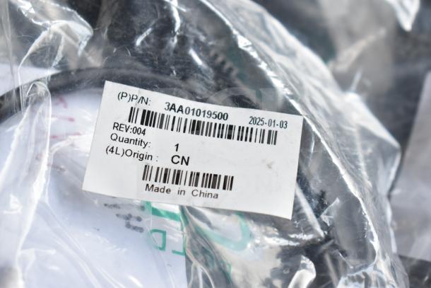 Pack of 10 items including AC adapter and cables, labeled P/N 3AA01019500, made in China, new condition.