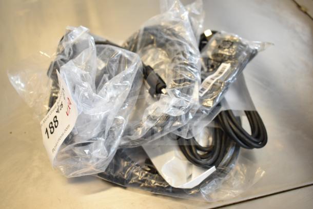 Bundle of 9 items including Belkin F2CD058 HDMI cable, AC-DC adapter, in plastic packaging, with auction tag 188.