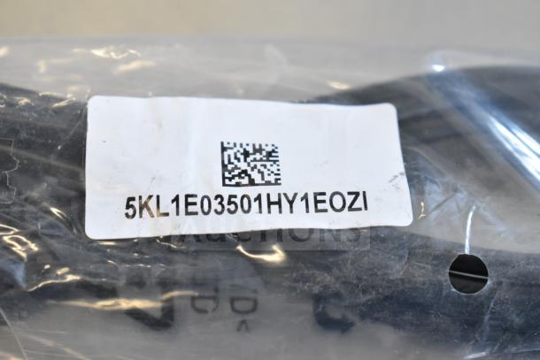 Bag with 9 items, including Belkin F2CD058 HDMI cable and AC-DC adapter. Label with alphanumeric code visible.