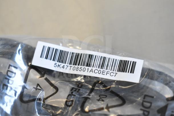 Clear plastic bag with barcode labeled "5K47T08501AC0EFC7," contains Belkin F2CD058 HDMI cable.