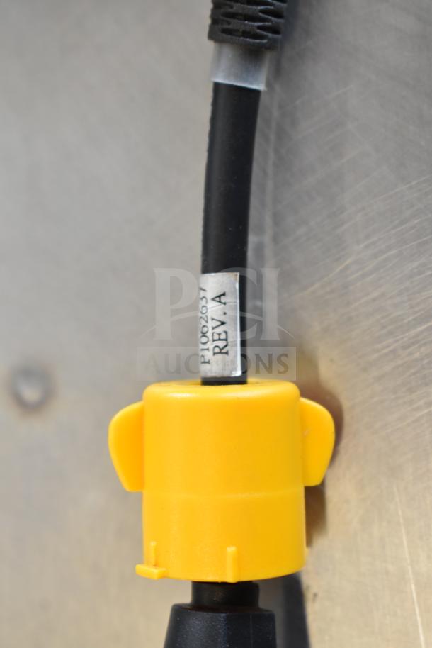 Yellow connector on black cable with visible label reading "P1002637 REV. A". Part of 9 various cables lot.