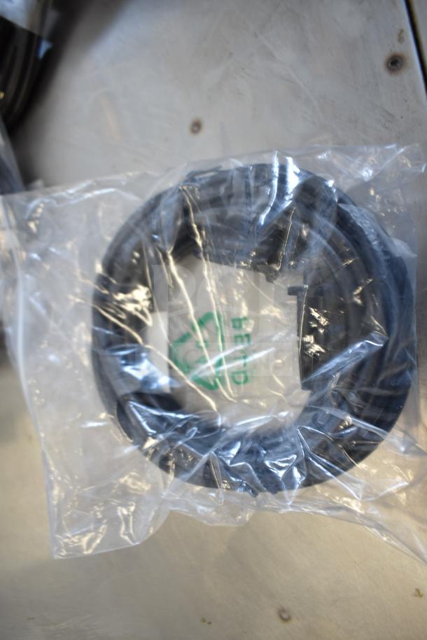 9 various cables in plastic packaging, including model 5K0EH03516JH0GLR7, Belkin adapter, new condition. Bidding item.