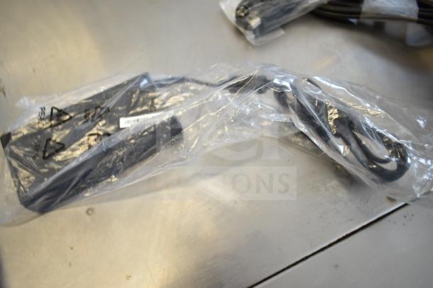 Nine various cables including models 5K0EH03516JH0GLR7, Belkin adapter, 2EA247BW04DEO3L16FZ; in sealed plastic bag.