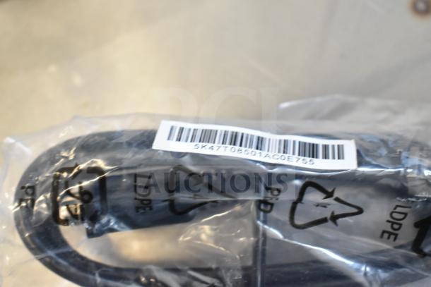 Clear plastic bag containing various black cables with visible barcode "5K47T08501AC0E755."