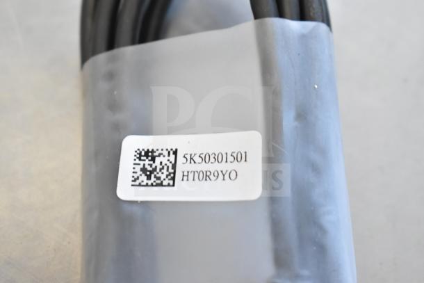 Nine various cables, including models 5K0EH03516JH0GLR7 and 2EA247BW04DEO3L16FZ, with a Belkin adapter. Labels show codes like 5K50301501.