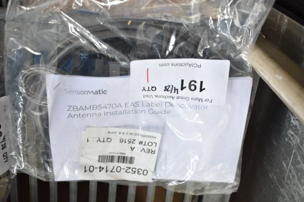 0352-0714-01 Antenna Cable, new in packaging with Sensormatic label, includes ZBAMB5470A installation guide.