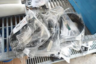 Nine assorted cables in packaging, including Zebra CBA-U52-S16PAR, auction lot 192, new condition.