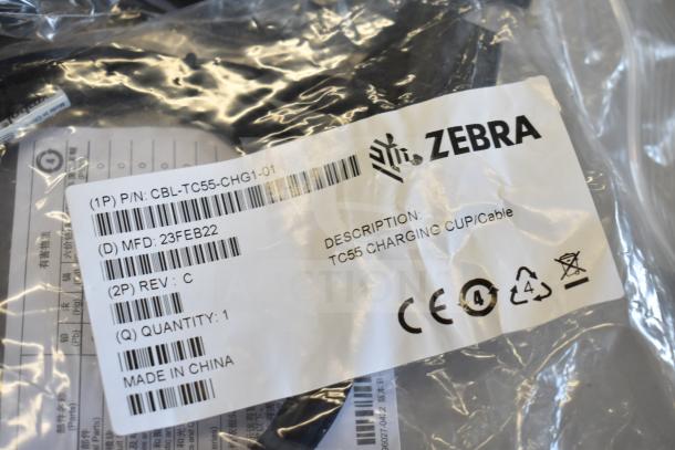 4 various cables including Zebra CBL-TC55-CHG1-01 Charging Cup Cable, new condition, labeled as manufactured on 23FEB22.