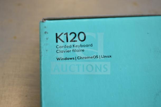 Box corner of Logitech K120 corded keyboard. Compatible with Windows, ChromeOS, Linux. Scratch and dent condition.