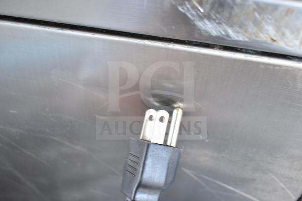 Hobart HTi-7LH4W commercial scale plug, 120/208-240V, 1 phase, against stainless surface; tested and working condition.